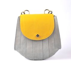 "This  Designer Genuine Leather Handbag Bag, Handmade Leather Bag, Handbag, Woman Leather Bag, Elegant Leather Bag, Shoulder Purse For Women. This leather is genuine and durable with little care it will last for years. You can keep the leather in good form by using leather balm. Item Description: *Material: Genuine leather *Dimensions: 3.5X10x9.50\" inches Bag *Compartment: 2 *Closure Type: Zipper *Handle: 13\" Inches  *Color options: Yellow & Gray (other colors available on request) *Care Instr Handmade Leather Bag, Baby Lounger, Bag Elegant, Purse For Women, Leather Bag Women, Genuine Leather Handbag, Leather Bags Handmade, Bag Handmade, Shoulder Purse