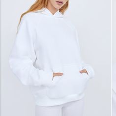 White Aritzia Tna Mega Hoodie, Super Comfortable. Size 1 Basic White Sweatshirt For Winter, Basic White Winter Sweatshirt, White Fleece Sweatshirt For Spring, White Hooded Sweater With Drawstring, White Fleece Hoodie Sweater, White Relaxed Fit Long Sleeve Hoodie, White Long Sleeve Relaxed Fit Hoodie, White Drawstring Hood Sweats For Winter, White Hoodie Sweats For Fall