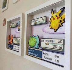 some pokemon pictures are hanging on the wall