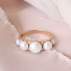 Beautiful Pearl & Diamond Ring - Lia.Product detail:♥ Five (5) pearls.♥ Side stones: natural diamonds 0.12 carat , F color, VS clarity. ♥ Material: 14K or 18k, yellow / white /rose solid gold.♥ Sizes available: 3 -9 . (bigger or smaller sizes are available, ring in photos size 6.5). ♥ In addition you can request IGL Jewelry certificate when ordering. Please select your wanted rings size, gold color and purity in drop down menu. --- Silly Shiny Service.♥ Each piece is specially and passionate 14k Gold Rings With Aaa Quality For Anniversary, Aaa Quality 14k Gold Rings For Anniversary, High Quality 14k Gold Rings For Anniversary, Heirloom White Pearl Ring With Prong Setting, White Pearl Ring With Rose Cut Diamonds For Anniversary, Wedding Rings With Akoya Pearl And Diamond Accents, Akoya Pearl Rings With Diamond Accents For Wedding, Fine Jewelry Akoya Pearl Rings With Brilliant Cut, Brilliant Cut Akoya Pearl Ring As Gift