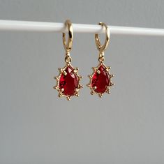 Ruby Red & Crystal Teardrop Teardrop Jewel Huggie Hoop Earrings, 14k Gold Plated Earrings, Vintage Style Earrings, Victorian Earrings  Product specifications: * Material: 14K Gold Plated Brass * Size Each charm measures 1.2 cm x 0.8cm Earring Options: * 8mm inner diameter hoops * 10mm inner diameter hoops Packaging and Gifts: * All pieces of jewellery are set on a card in a mesh jewellery pouch  Shipping: * All Australian orders will be shipped out within 1 - 3 days by standard untracked letter Victorian Earrings, Vintage Style Earrings, Ruby Earrings, Red Crystals, Huggie Hoop Earrings, Earrings Vintage, Style Earrings, Gold Plated Earrings, Beauty Accessories