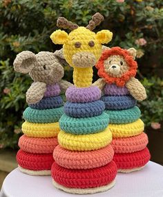 crocheted stuffed animals are stacked on top of each other