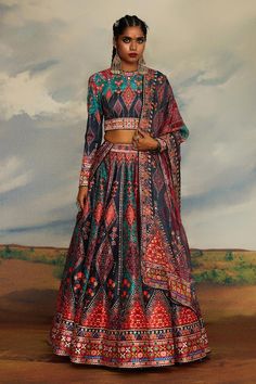 Multi color blouse with tribal print and threads, beads embroidery. Paired with coordinating lehenga and dupatta. - Aza Fashions Bohemian Lehenga With Pallu For Navratri, Bohemian Semi-stitched Choli For Navratri, Semi-stitched Bohemian Choli For Navratri, Anarkali Set With Intricate Embroidery For Festivals, Bohemian Sets With Multicolor Embroidery For Navratri, Bohemian Embroidered Sets For Navratri, Bohemian Multicolor Embroidered Sets For Navratri, Bohemian Embroidered Multicolor Sets For Navratri, Bohemian Semi-stitched Choli With Pallu