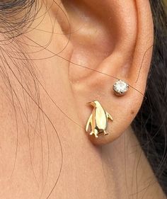 Features - Made to order - Materials: Solid Gold - Gold Color: Yellow Gold, White Gold and Rose Gold - Dimension: 11.40 x 8.20 mm Approximately - Thickness: 2.00 mm Approximately - SKU: SP12QF Note: The listing for penguin earrings only. Thanks! All Gold pieces are stamped with the metal type on the inside.  CONTACT US If you have any questions, please send us a message! CHECK OUT OUR OTHER SHOP We have another shop selling wedding bands and fine fashion jewelry with over 60,000+ sales and 14,000+ 5 star reviews. You can visit our other shop @ https://www.etsy.com/shop/qcustomjewelry Q Fine Jewelry offers a lifetime guarantee on all of our items. If you ever experience any issues with your purchase, please send us a message and we would gladly help! If the issue is due to manufacturing, we Ocean Marine Life, Penguin Earrings, Gold Animals, Animal Earrings, Jewellery Ideas, Animal Jewelry, Gold Gold, Marine Life, Custom Rings