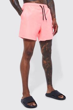 If it's comfort that you're looking for in men's holiday fashion, pick a pair of shorts from our unrivalled selection. You haven't been skipping leg day, have you? No, we know you wouldn't. All the better as you'll want to sport some of our stylish denim shorts, chino shorts, jersey shorts or cargo shorts. If you're looking for new outfit ideas for this summer, consider pairing a horizontal striped t-shirt with jean shorts or opt for a printed shirt and chino shorts for a smarter combo. Round off with a pair of sliders or loafers for extra style points. A Bigger Splash, New Outfit Ideas, Plus Size Joggers, Going Out Trousers, Going Out Shirts, Pink Swim, Party Mode, Gym Hoodie, Gilet Costume