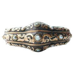 This Great old bangle bracelet, hand- made in Europe by very skilled jeweler, ca. 1880s - 1920s. Composite construction with frontal parts made of Silver on solid 14K Yellow and Rose Gold. Carved floral ornamentation Pearls mounted in three rows. The V- lock is very secure and firm that close with distinctive loud click sound.One wired security closure makes it extra safe to wear. Anatomically correct construction, this bangle will fit the wrist very comfortably and will not twist around. Not ha Luxury Antique Filigree Bangle, Elegant Bronze Bangle Bracelet, Antique Gold Bangle For Formal Occasions, Antique Gold Bangle Jewelry For Formal Occasions, Elegant Antique Gold Bangle Bracelet, Formal Bronze Bangle Jewelry, Victorian Yellow Gold Bangle Bracelet, Victorian Style Yellow Gold Bangle Bracelet, Elegant Bronze Bangle Jewelry