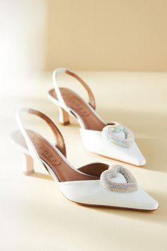 Finished with a rhinestone-encrusted heart, these pointed-toe slingback pumps are ready for all your magical moments. | Heart Slingback Kitten-Heel Pumps by Vicenza in White, Women's, Size: 36, Leather at Anthropologie Cream Heels Wedding, Wedding Kitten Heels, Lace Kitten Heels, Barker Wedding, Classic Wedding Shoes, White Kitten Heels, Bridal 2023, Vintage Pumps, White Kitten