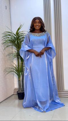 Indulge in the elegance of our Luxury Chiffon collection. This exquisite light blue dress features a beaded neckline exuding sophistication and style, perfect for any special occasion. Africa Dress, Light Blue Dress, Dress Light Blue, Marine Uniform, Chiffon Collection, Light Blue Dresses, Beaded Neckline, Traditional Dress, Chocolate Molds