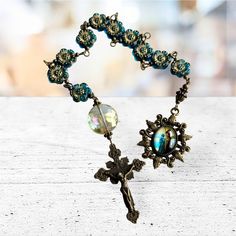 Handmade rosary chaplet made with Czech beads 10mm, Electroplate beads 16mm, findings and religious images. Jesus Christ Measurement :  16 inches long  Cross- 1-3/4 inches Imagen Pendant 1-3/4 x 1-1/2 inches   Please check out our SHOP POLICY and SHOP ANNOUNCEMENT before you make any payment, thank you. http://www.etsy.com/shop/rbckcreations/policy   Thanks for taking a look and stopping by my shop! Spiritual Rosary With Miraculous Medal And Crucifix, Adjustable Crucifix Rosary, Adjustable Spiritual Rosary With Miraculous Medal, Spiritual Beaded Rosary Bracelet With Crucifix, Adjustable Spiritual Rosary With Spacer Beads, Adjustable Beaded Rosary Bracelet With Crucifix, Adjustable Rosary With Miraculous Medal And Crucifix, Spiritual Rosary Bracelet For Jewelry Making, Vintage Adjustable Rosary With Round Beads