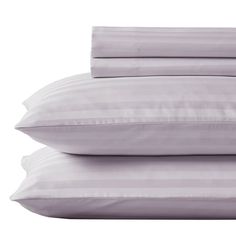 three pillows stacked on top of each other