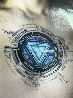 a man's chest with a futuristic design on it