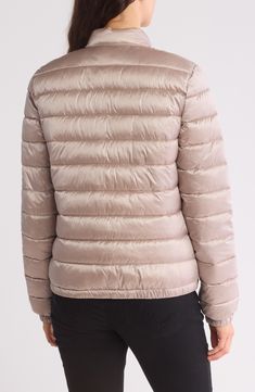 This moto-inspired puffer quilted with 15F warmth factor is water- and wind-resistant with a stand collar and patch pockets. Lined 51% polyester, 49% nylon; fill: 100% polyester Machine wash, tumble dry low Imported Model stats: 5'10", 32" bust, 25" waist, 36" hip. Model is wearing size Small. A Stand, Cappuccino, Puffer Jacket, Stand Collar, Patch Pocket, Nordstrom Rack, Calvin Klein, Puffer, Nordstrom