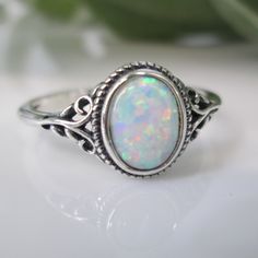 Dainty Opal Ring. Best Seller. For Your Consideration Is This Oh So Pretty 925 Sterling Silver And Opal Ring. Simple, Comfortable, And Beautifully Crafted. Face Height On This = 10mm. An Oval Fiery White Lab Opal Is The Star. A Little Oxidized Detailing Is A Great Accent To This Lovely Oval Opal Stone. Ref:Sid-F26 Opal And Silver Ring, Oval Sterling Silver Stackable Rings, Oval Sterling Silver Stackable Rings Fine Jewelry, White Oval Stackable Rings For Anniversary, White Oval Cabochon Promise Ring, Classic Oval Opal Ring, White Oval Birthstone Ring For Gifts, Dainty White Oval Birthstone Ring, Oval Opal Stackable Rings