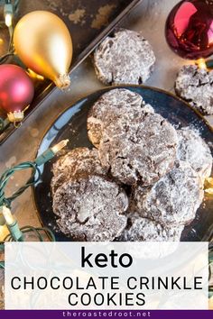 keto chocolate crinkle cookies on a plate with christmas ornaments in the background