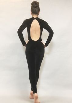 Introducing "Black Cat" – a captivating bodysuit costume tailored for dancers and circus performers.Fabric:Experience the allure of high-quality velvet Lycra with 4-way stretch – firm, flexible, and non slippery. Available in a variety of colors.Design:Immerse yourself in the sleekness of this velvet bodysuit featuring long sleeves , 1” scoop neck with snap button on the back of the neck. The open back adds an extra touch of elegance.Customization:Ready for a personalized touch? Contact me for a Cat Dance Costume, Fitted Backless Leotard For Party, Fitted Backless Party Leotard, Black Fitted Unitard For Costume Party, Fitted Black Unitard For Costume Party, Stretch Dancewear Bodysuit For Costume Party, Full Length Stretch Unitard For Party, Fitted Full-length Unitard For Dance, Full Length Fitted Dancewear Unitard