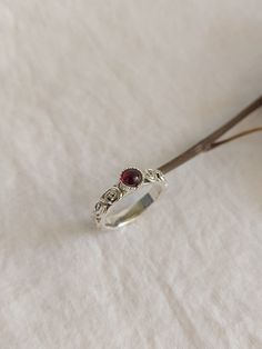 Dainty Beautiful gemstone ring, made of sterling silver handmade spirals all around the ring. Mother-daughter Ring, for women or girls. Everyday jewelry, birthstone ring. Red Garnet size: 4mm. Dainty ring, the width of the ring: 0.2 inches 🔸 High-quality Jewelry with Unique Techniques. 🔸 My customer service is available 7 days a week. 🔸 Jewelry Gift box for any purchase. 🔸 Wish for a personal message card? I can make it. 🔸 A tracking number to follow your package. 🔸 Personalized custom-mad Garnet Silver Ring, Mother Daughter Rings, Silver Garnet Ring, Daughter Ring, Garnet Ring Silver, Devil Costume, Red Garnet Ring, Zierlicher Ring, Stack Ring