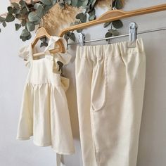 Beige linen wedding page boy pants, some pants that you can wear also in the christening ceremony of a nice cream color, some very comfortable and cool rustic ivory pants for spring. It's the cutest thing, the perfect gift for toddlers and newborns. Ideal garments for fun moms or to make a very special gift. You'll find many assorted items in the store, it's up to you to compose your own batches! This garment is made with 100% high quality fabric (cotton). Each garment is designed, printed, cut, Cotton Matching Outfits For Summer, Beige Cotton Sets For Spring, Summer Cotton Matching Outfits Sets, Summer Matching Cotton Outfit Sets, Beige Cotton Spring Sets, Spring Beige Cotton Sets, Cotton Long Pants Set For Summer, Summer Cotton Sets With Long Pants, Cotton Bottoms Matching Set For Summer