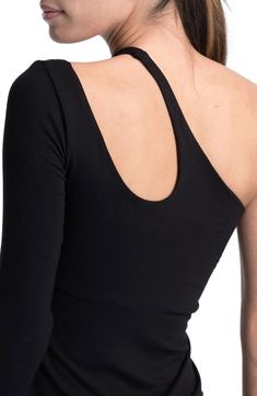 This close-fitting top is designed in a sleek shoulder-baring silhouette with an edgy neckline cutout. One-shoulder neck Single long sleeve 96% Tencel® lyocell, 4% elastane Tencel lyocell is a more-sustainably produced fiber made with closed-loop processing Machine wash, line dry Imported Black One-shoulder Elastane Tops, Cutout Tops For Night Out, Fitted Asymmetrical Seamless Top, Elastane Cutout Tops For Night Out, Seamless Fitted Asymmetrical Tops, Asymmetrical Seamless Fitted Tops, Night Out Cutout Tops, Fitted Off-shoulder Crop Top For Night Out, Black One-shoulder Top With Asymmetrical Neckline