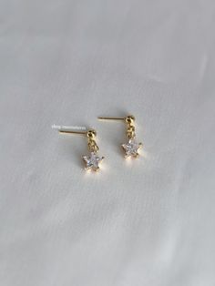 A timeless pair of cubic zirconia studs that match everything. An absolute essential in every jewelry collection. - Comes with butterfly + jelly earring backs - 4mm stainless steel ball studs - 24k gold plated charms Star Angel, Gift Ideas Birthday, Angel Heart, Heart With Wings, Ideas Birthday, Wing Earrings, Star Studs, Gold Star, Birthday Present