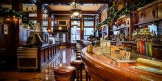 the bar is decorated with christmas lights and decorations