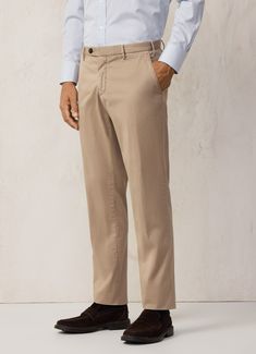 These classic trousers are made from stretch cotton and feature an attractive garment wash. Lightweight and versatile, pair with a jacket from our new mid-season collection.   - Regular fit  - Front button and zipper closure  - Italian side pockets  - Hidden coin pocket in waistband  - Garment wash  - Back welt pockets with button Fitted Chinos For Business Casual With Pockets, Slim Fit Pants With Welt Pockets For Business Casual, Cotton Suits For Business Casual, Elastane Chinos For Business Casual, Slim Fit Straight Chinos For Business Casual, Semi-formal Elastane Pants With Welt Pockets, Business Casual Elastane Chinos, Fitted Chinos With Pockets For Semi-formal Occasions, Fitted Semi-formal Chinos With Pockets