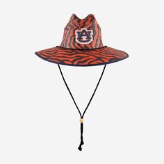 Camping trips. Beach days. Gamedays. Keep the sun out of your eyes and your team spirit on your head with the Auburn Tigers Thematic Straw Hat. Features All-over team-colored design so you can rep the team in style Thematic, team-specific pattern that will look great with the rest of your team apparel Sturdy straw construction that makes this a fit for your summer style Embroidered team logo display, in case there were any doubts where your allegiances lie Black lace chin string for a comfortabl Casual Hats With Uv Protection For Sports Events, Casual Sports Hat With Uv Protection, Adjustable Visor Hat For Fan Gear, Team-colored Adjustable Hat With Curved Brim, Adjustable Team Spirit Hat For Fan Gear, Adjustable Hats For Team Spirit, Adjustable Visor For Fan Gear, Adjustable Flat Brim Sports Fan Hat, Adjustable Game Day Hats With Team Spirit