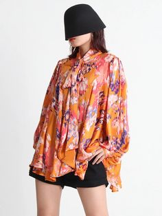 SIZE Shoulder:34cm Bust:160cm Waist:214cm Sleeve length:63cm Length:72cm Note: 1 inch = 2.54 cm, 1 cm = 0.39 inch note: measurement by hands allow 2-4cm errors which is normal Orange Silk Tops For Spring, Orange Silk Top For Spring, Spring Orange Silk Top, Chic Multicolor Print Blouse For Fall, Chic Multicolor Print Fall Blouse, Multicolor Abstract Print Long Sleeve Blouse, Multicolor Fashion Print Top For Fall, Multicolor Tops With Unique Print For Spring, Multicolor Silk Shirt For Spring