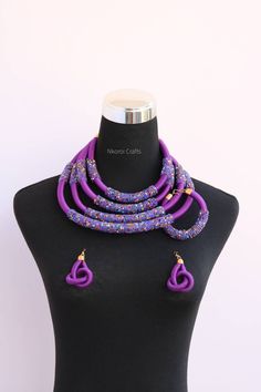 African beaded necklaces, Statement Thread necklace, Rope necklace, African beaded women jewelry, Christmas gift for her, Moms gift An elegant necklace that can match any outfit. Handmade by the Maasai women in Kenya using fine beads and silk yarn. Color: Purple Available in different colors. 3-5 days delivery via DHL Express. Pay shipping fee for the first item only and additional items ship for free. To view more items in our shop, kindly click here: nkoroicrafts.etsy.com Purple Necklace With Colorful Beads For Gift, Purple Necklaces With Colorful Beads For Gift, Purple Beaded Necklaces With Round Beads Gift, Purple Round Beaded Necklaces As Gift, Handmade Purple Beaded Necklace Gift, Handmade Purple Beads For Gifts, Purple Necklace With Spacer Beads As Gift, Purple Necklace With Spacer Beads For Gift, Purple Beaded Necklaces For Gifts