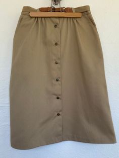 28-30" waist (unstretched/stretched), 41" hip, 25.5" long. Belt needs repair if you choose to use it, as shown. Skirt With Pockets, Knee Length Skirt, Skirts With Pockets, Minneapolis, Favorite Outfit, Knee Length, 1970s, Art Collection, Womens Skirt