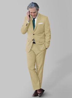 Sophisticated and extremely functional, our Stretch Beige Wool Suit maintains a sharp aesthetic from your morning coffee to evening cocktails. Crafted from wool polyester and lycra blend, the classic beige color and smooth feel of the suit is a perfect combination for a stylishly refined cold weather look that is timeless and comforting.    Look Includes  Stretch Beige Wool Fabric  Two Button Jacket Style  Notch Lapel  Horn Brown Buttons  Single Vent  Three Cuff Buttons  Two Welted Back Pockets on Trousers   You can change the look during customization if required.  Lining: Viscose, Dry Clean. Elegant Beige Suits With Welt Pockets, Beige Single Breasted Suits For Business Casual, Beige Fitted Suit For Formal Occasions, Fitted Beige Suit For Formal Occasions, Beige Single Breasted Suit For Business Casual, Classic Beige Suit For Formal Occasions, Beige Suits For Business Casual With Flat Front, Classic Beige Suits For Formal Occasions, Beige Business Casual Suits With Flat Front