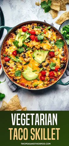 vegetarian taco skillet with tortilla chips and avocado on the side