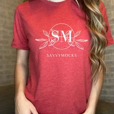 SavvyMocks is here to make selling your tees simple! Grab your favorite design and place it directly onto our model mockup and you're good to go! *It's All About the Details* -Bella+Canvas 3001CVC Heather Red -Model is wearing size Small -File Format is JPG *Important Information* -You may use this image for personal or commercial use. -You may not resell, edit, or share this image in any way. -SavvyMock logo will not be on the image after purchase. Red Tri-blend Graphic Tee, Red Tri-blend T-shirt With Letter Print, Red Graphic Tee With Branding, Red Cotton T-shirt With Custom Print, Casual Red T-shirt With Branding, Red Casual T-shirt With Custom Print, Red Cotton T-shirt With Branding, Casual Red T-shirt With Custom Print, Red Pre-shrunk Tri-blend Top