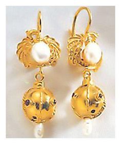 An antique reproduction of a Hellenistic Greek creation, these golden spheres, adorned with rice pearls and garnets, illustrate the ornate syle for which the late Greek period was known.  The intricate filigree work is handcrafted of 24k gold over sterling silver. Size: 1 1/2 inches. Elegant Yellow Gold Earrings With Historical Design, Traditional White Pearl Pierced Earrings, Traditional White Pearl Earrings, Elegant Round Pearl Earrings With Intricate Design, Traditional Gold Baroque Earrings, Elegant Gold Beaded Pearl Earrings, Elegant Festive Pearl Earrings, Ornate Yellow Gold Pearl Drop Jewelry, Elegant Jewelry With Intricate Design And Round Beads