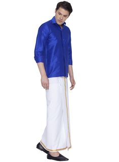 Vastramay Men's Blue Cotton Silk Blend Shirt and Dhoti Set The Vastramay Men's Blue Cotton Silk Blend Shirt and Dhoti Set combines traditional charm with modern comfort, ideal for ceremonial occasions and celebrations. Features of Vastramay Men's Blue Cotton Silk Blend Shirt and Dhoti Set Elegant blue color for a sophisticated appearance. Made from a luxurious blend of cotton and silk for a soft and comfortable feel. Traditional design with contemporary appeal. Shirt features a classic collar an Boys Wear, Cotton Silk, Traditional Design, Blue Man, Blue Color, Silk, Collar, Celebrities, How To Wear