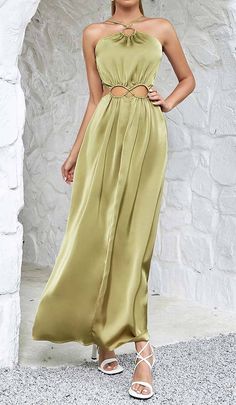 Captivate the room in this olive green satin maxi dress designed with a skin-baring rectangular waist cutout. The slim shoulder straps and floor-grazing skirt provide an elegant contrast to the provocative cutout. Strut your stuff at formal events in this scene-stealing stunner. Gentle Dry Clean Only Colour may vary due to lighting on images. The product images (without model) are closest to the true colour of the product.Item runs true to size chart and is cut to suit our size chart. Please ref Green Satin Maxi Dress, Maxi Dress Designs, Evening Dresses Cocktail, Satin Maxi, Satin Maxi Dress, Junior Bridesmaid, Green Satin, Junior Dresses, Product Images