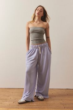 Wardrobe-staple sweatpants by Out From Under that you'll reach for again and again. Cut from fabric with an ultra-soft feel in a slouchy fit we love with a mid-rise and a baggy wide-leg. Finished with side-split hems. Find it exclusively at UO. Features Out From Under sweatpants made to be lived in Relaxed slouchy fit Pull-on with easy side pockets UO exclusive Content + Care 58% Cotton, 42% polyester Machine wash Imported Size + Fit Model in Grey is 5’7" and wearing size Small Measurements take Spring Sweatpants With Elastic Waistband For Relaxation, Spring Sweatpants For Relaxation With Elastic Waistband, Comfortable Sweatpants For Spring Relaxation, Wide Leg Sweatpants With Drawstring For Lounging, Comfy Wide Leg Sweatpants For Spring, Comfy Wide-leg Spring Sweatpants, Casual Wide Leg Loungewear Pants, Comfy Wide Leg Sweatpants For Relaxation, Comfy Wide-leg Spring Bottoms