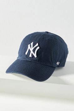 What Makes It Great : Rendered in only-at-Anthro colors, this cap is sporty, cool, and trendy. Wear it with jeans and a tee or dress it up for a sporty-chic look. | NY Baseball Cap by '47 in Blue, Women's, Cotton at Anthropologie Baseball Cap Outfits For Women, Ny Baseball Cap, Baseball Hats For Women, Sporty Cap, Ny Baseball, Trendy Caps, Camping Summer, Vintage Baseball Caps, Tv Land