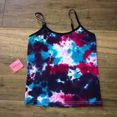 Under Bandz Camisole - Tie-Dye Condition - New W/ Tags Size - 6 100% Authentic, Buy With Confidence! All Purchases Will Be Shipped Within 1 Business Day! Check Out My Closet For Other Items Buy 3 Get 5% Off Fitted Multicolor Casual Camisole, Tie Dye Cotton Tank Top, Fitted Tie Dye Cotton Tank Top, Tie-dye Cotton Tank Top, Fitted Cotton Tie Dye Tank Top, Trendy Tie Dye Sleeveless Tank Top, Purple Cotton Camisole Top, Trendy Summer Tie Dye Tank Top, Tie Dye Stretch Sleeveless Tops