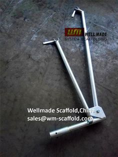 two metal poles on the ground in front of a sign that reads weldmade scaffold china sales @ wn - scaffold com