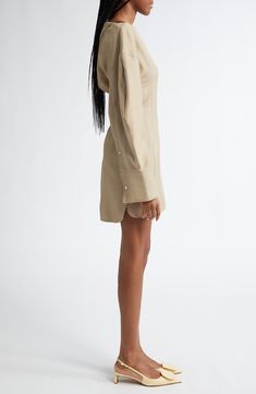 The French label's proclivity for playing with proportions manifests in the sculpted waist and voluminous lantern sleeves of a bateau-neck dress tailored from a wool-warmed blend. 32 1/2" front length; 33 1/2" back length (size 38 FR) Bateau neck Long sleeves Chest patch pocket 55% polyester, 45% virgin wool Dry clean Made in France Designer Clothing Elegant Long Sleeve Neutral Mini Dress, School Wear, Bateau Neck, Maternity Shops, Lingerie Romper, Designer Clothes For Men, Lantern Sleeve, Denim Jumpsuit, Fit Inspo