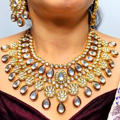 Exotic and snag-free kundan beaded necklace set with earrings. This is a stylish set with White Kundan. This set will work well with traditional, formal, and western formals. Option 1: White Color (D765) Option 2: Red Color (D766) Eye-catching and unique jewelry that will set you apart. Gift this piece to a loved one, and see their face light up with joy. Best for gifting or for personal use, wear it to any occasion and become the spotlight.