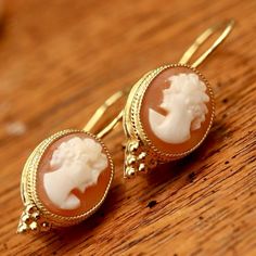 https://store.museumofjewelry.com/collections/cameo/products/rendezvous-earrings Roman Decor, Dr Jewelry, Ancient Roman Jewelry, Antique Urn, Roman Jewelry, Grey Moonstone, Replica Jewelry, Cameo Earrings, Neo Classical