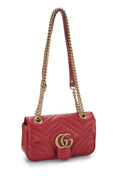 Find GUCCI Gg Marmont Shoulder Bag on Editorialist. The Gucci GG Marmont Shoulder Bag features a quilted design and a gold-tone GG logo. It has a flap closure with a push lock, a chain strap that can be worn on the shoulder or crossbody, and a small size. The bag is crafted from leather and has a smooth finish. Luxury Gold Quilted Bag, Luxury Quilted Gold Bag, Red Quilted Leather Shoulder Bag, Gucci Red Shoulder Bag With Gold-tone Hardware, Red Gucci Shoulder Bag With Gold-tone Hardware, Designer Quilted Gold Shoulder Bag, Designer Quilted Gold Bags, Designer Gold Quilted Shoulder Bag, Gucci Rectangular Bag With Gold-tone Logo Plaque