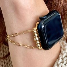 High Quality 14k Gold Metal 3.4mm Small Paperclip Chain Bracelet For Apple Watch 38mm 40mm 41mm 42mm 44mm 45mm All Series With Gold Filled Stainless Steel Attachments/Connectors Plus Gold Filled Sterling Silver Beads & Lobster Claw Clasp Adjustable Size Female Style Smartwatch Posh Jewelry Designed & Handmade By Simeon D Jewelry Studio Please Watch The Video On How To Put The Bracelet On Your Own Please Measure Your Wrist As Pictured & Select Size Elegant Stylish Gift For Any Holiday Or Occasion Classic Gold Watch Bands As Gift, Adjustable Gold Watch Band With Solid Link Construction, Classic Metal Watch Bands For Gifts, Elegant Gold Metal Apple Watch Band, Adjustable Yellow Gold Watch Bands For Gift, Gold Watch Band As Gift, Gold Metal Apple Watch Band As Gift, Modern Gold Apple Watch Band As A Gift, Yellow Gold Watch Bands For Gifts