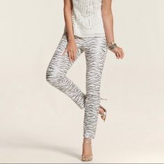 Chico’s Platinum Ultimate Fit Metallic Silver Zebra Print Ankle Jeans Ultimate Fit - Flatters, Slims, Lengthens - Ecru / Metallic Gray Silver Zebra Animal Print - Ultimate Fit Sits Just Below The Waist, With An Easy, Elegant Line From Hip To Knee. - Premium Washes Have A Fine, More Refined Weave For Superior Stretch And Recovery. - Front Zip And Button Closure - Classic 5 Pocket Style Materials: Cotton, Polyester, Spandex Size: Chico’s Size 1 = Medium / 8 Condition: New With Tags Measurements In Silver Stretch Bottoms For Spring, Elegant Silver Bottoms For Spring, Elegant Stretch Silver Bottoms, Elegant Silver Bottoms For Summer, Zebra Animal, Fit N Flare Dress, Ankle Jeans, Style Profile, Zebra Print