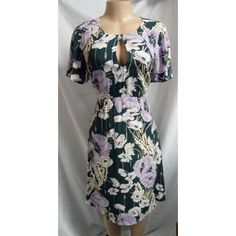 Ann Taylor $119.99 Color: Deep Green, Lilac, Off White, Tan. Floral Print Scoop Neckline. Small Keyhole At Bust With Button Closure. Waistline. Flare Short Sleeves. Princess Seams At Bodice. A Line Skirt. Back Zipper, Hook & Eye Closure. Lined Bodice. Approximate Measurements Are Taken On A Flat Surface: Bust: Under To Underarm 18" Waist: 15 1/2" Length: Shoulder To Hem 36" Material: 100% Viscose Lining: 100% Polyester. Machine Wash Cold. Condition: New With Tags. Purple Floral Print Knee-length Mini Dress, Elegant Purple Floral Print Mini Dress, Purple Floral Print A-line Midi Dress, Purple A-line Midi Dress With Floral Print, Purple Floral Print Knee-length Midi Dress, Purple Floral Print Short Sleeve Midi Dress, Knee Length Dresses Casual, Vintage Print Dress, Red Sleeveless Dress