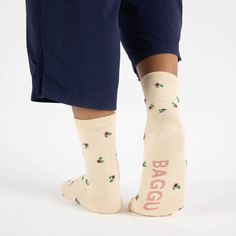 Featuring Baggu's signature patterns and color combinations, this pair of crew-length socks add a fun accent to your wardrobe. Their lightweight material is made from bamboo rayon with some polyester/nylon elastic to provide a bit of stretch and fits US women's 6-11 or US men's 4.5-9.5. This pair of Baggu Crew Socks is machine-washable in warm water, tumble dry low. Trendy Beige Cotton Socks, Beige Cotton Socks For Summer, Faith Ringgold, Bedroom Candles, Scarf Organization, Us Man, Rare Books, Design Store, Crew Socks