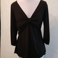 This Nwt Black Pullover Top From Max Studio Specialty Products Features Bow Detail At Neck And Three Quarter Length Sleeves With Elastic Band. Machine Washable, This Sexy And Versatile Top Could Be Worn With A Suit Or With Jeans Or A Skirt. Light And Comfortable, Size Medium, 95% Polyester, 5% Spandex. Elegant Black V-neck Long Sleeve Top, Black Fitted Half Sleeve Tops, Elegant Stretch Top With 3/4 Sleeves, Elegant Stretch Top With Half Sleeves, Elegant Black Long Sleeve V-neck Top, Elegant Black Stretch Long Sleeve Top, Fitted Black Top With 3/4 Sleeves, Fitted Black Blouse With 3/4 Sleeves, Black Fitted Blouse With 3/4 Sleeve