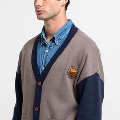 This is where it all began! The Vox Machina Varsity Cardigan was designed with love and respect for details to help you stay warm and cozy whether you're revisiting the highs of Campaign 1 or heading out for adventures of your own. Vox Machina patch on the front chest Vox Machina campaign patch on the sleeve Critical Role icon patch on the front pocket Chenille embroidered Vox Machina emblem on the back Sweater Knit: 50% rayon, 30% nylon, 20% recycled polyester 2 front pockets 4 button closure I Long Sleeve Outdoor Cardigan, Casual Fall Cardigan For Outdoor, Casual Fall Outdoor Cardigan, Cozy Long Sleeve Cardigan For Outdoor, Long Sleeve Cardigan For Fall Outdoor, Long Sleeve Fall Cardigan For Outdoor, Cozy Winter Cardigan For Outdoor, Cozy Winter Outdoor Cardigan, Fall Outdoor Wool Cardigan