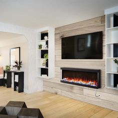 a living room with a fireplace and television mounted on the wall next to a couch